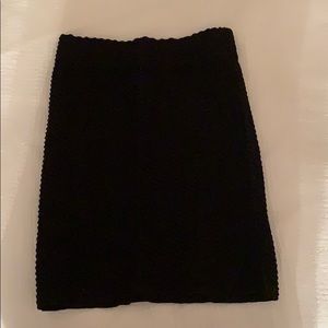 Tight fitting black skirt